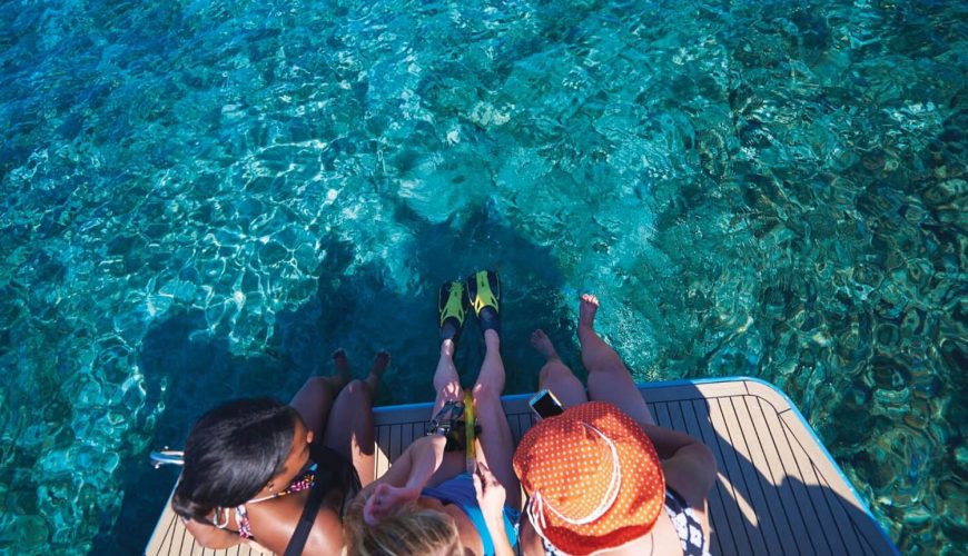 private boat tour Split Croatia swimming in crystal clear water hidden bay